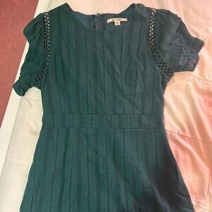 Women’s teal dress size medium.